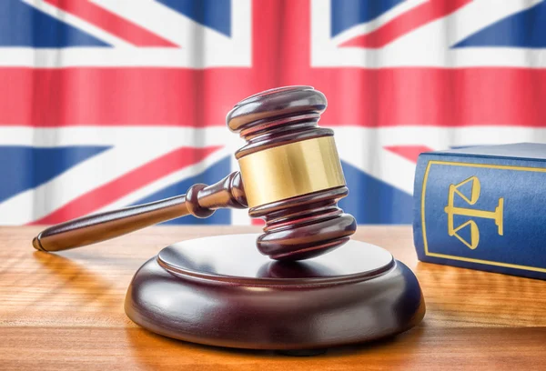 A gavel and a law book - United Kingdom — Stok fotoğraf