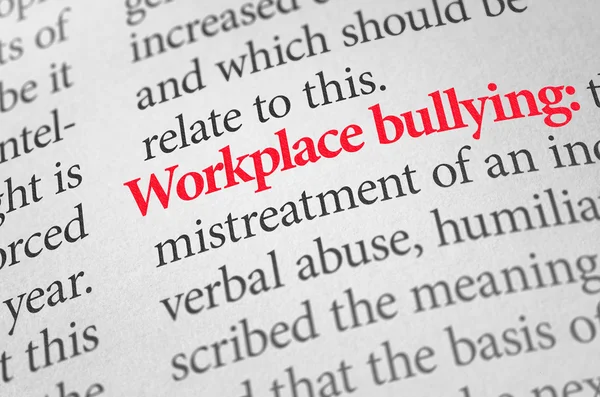 Definition of the term Workplace bullying in a dictionary — Stok fotoğraf