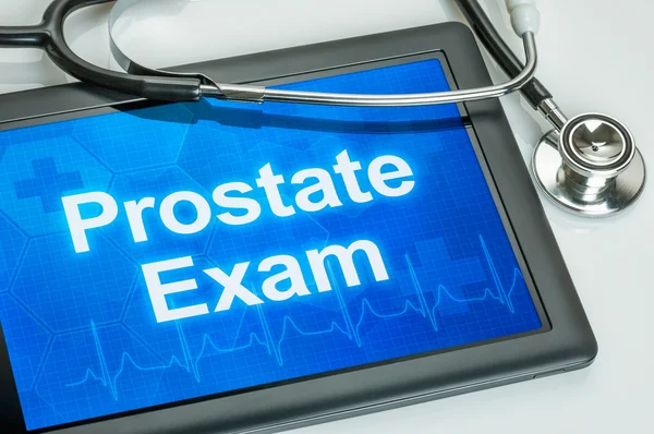 Tablet com a palavra Prostate Exam na tela — Fotografia de Stock