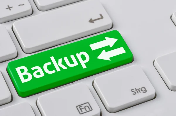 Una tastiera con un pulsante verde - Backup — Foto Stock