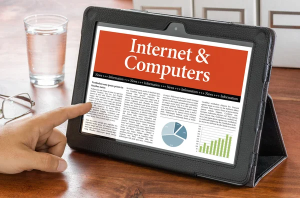 A tablet computer on a desk - Internet and Computers — Stock Photo, Image