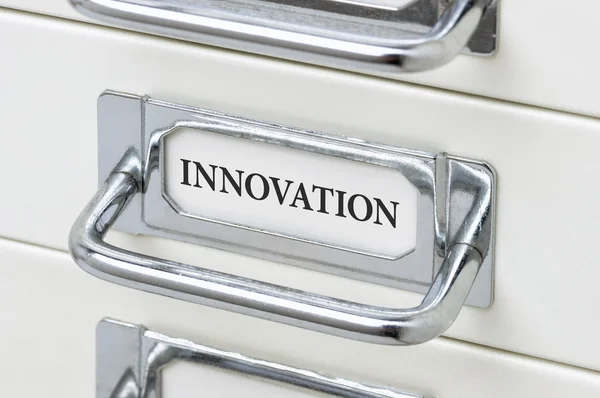 A drawer cabinet with the label Innovation — Stock Photo, Image