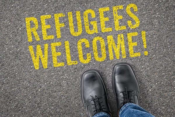 Text on the floor - Refugees welcome — Stock fotografie