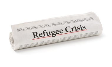 Rolled newspaper with the headline Refugee Crisis clipart