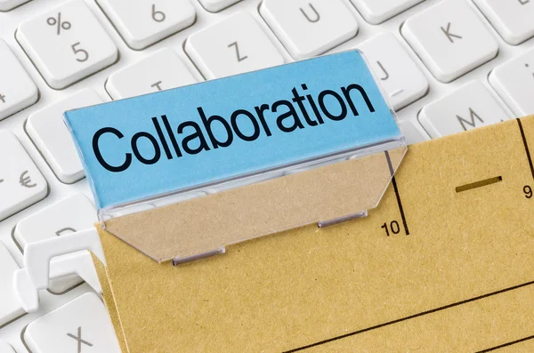 A brown file folder labeled with Collaboration — Stock Photo, Image