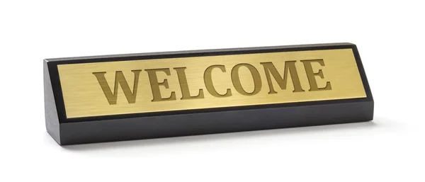 Uma placa de nome sobre um fundo branco com a gravação Welcome — Fotografia de Stock