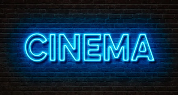 Neon işareti bir tuğla duvara - sinema — Stok fotoğraf