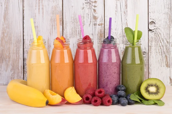 Fruit smoothies variety in rainbow colors — Stock Photo, Image