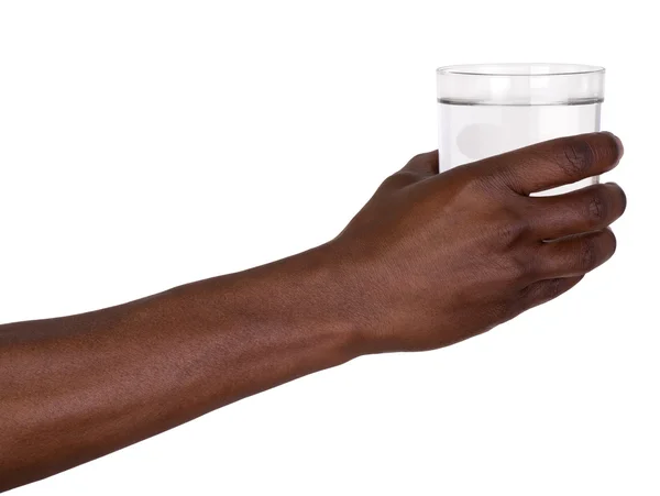 Man som håller ett glas vatten — Stockfoto