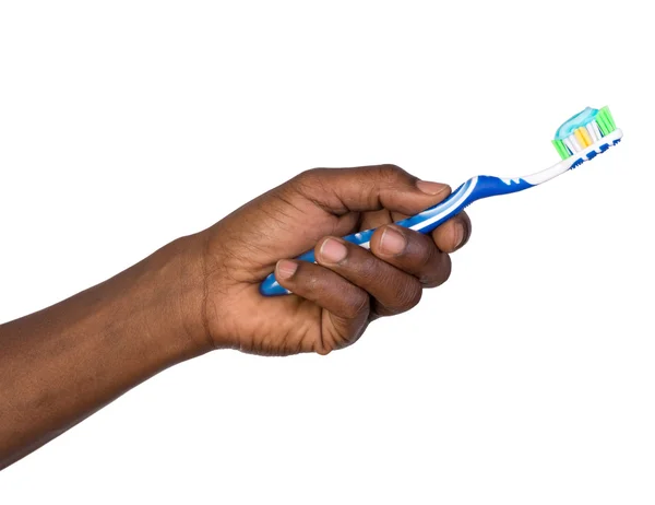 Man holding a toothbrush — Stock Photo, Image