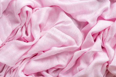 Buruşmuş keten kumaş dokusu. Kırışık tekstil. pembe.
