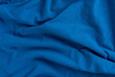 Buruşmuş keten kumaş dokusu. Kırışık tekstil. Mavi.