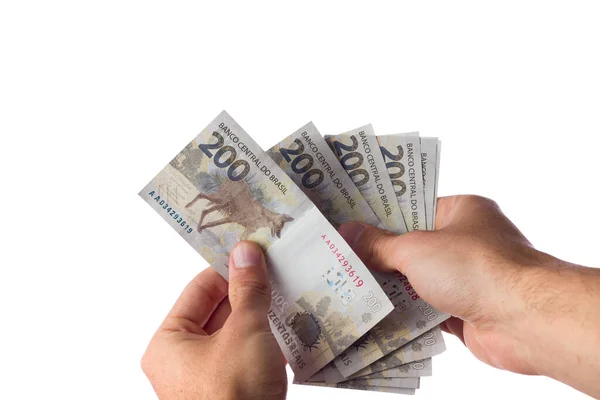 Homem Segurando 200 Reais Contas Isoladas Branco Dinheiro Brasileiro Pagamento — Fotografia de Stock
