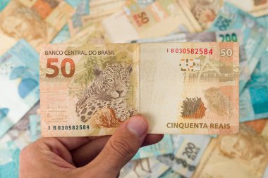 Brazillian Money, 50 Reais banknot tutan adam.
