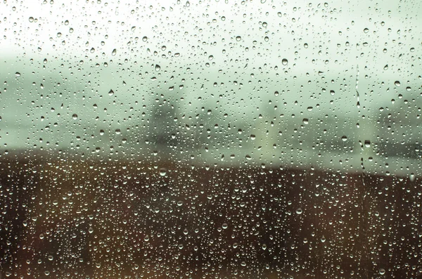 Gocce di pioggia su una finestra — Foto Stock