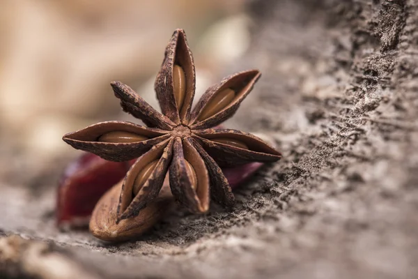 Star anise over a wooden surface — Stock Photo, Image