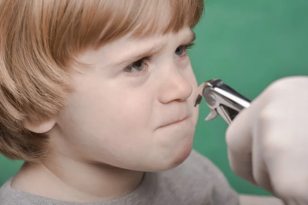 Small child and dental instrument — Stock Photo, Image