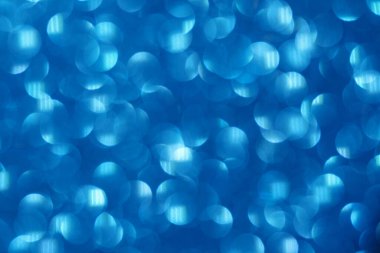 Mavi soyut ışıklar arka plan, parlayan bokeh, ışıldayan ve parıldayan arkaplan bulanık görüntü