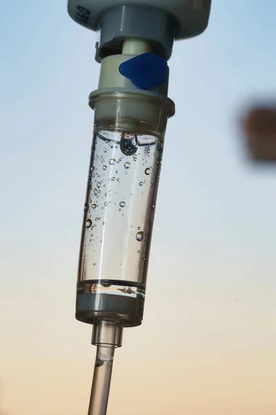 Closeup  of a saline IV drip Infusion bottle with IV solution for patients in hospital