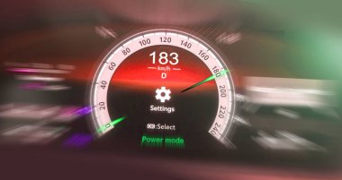 A car dashboard driving 183 kilometers per hour, selective focus