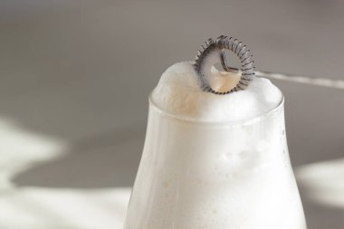 Milk foam maker. Mini blender, frothers for coffee, latte clipart