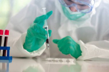 Doctor testing vaccine protect coronavirus covid19 finished success in hospital lab