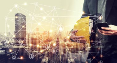 Close up holding mobile smartphone using internet technology connection