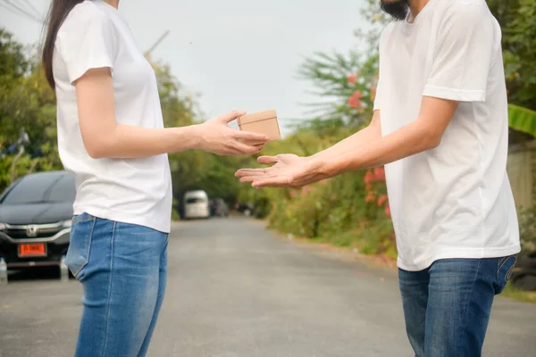 People giving giftbox concept happy new year, Valentine\'s day, Man giving giftbox to women