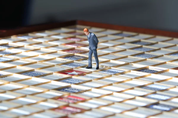 Business Man on Game Board — Stock Photo, Image