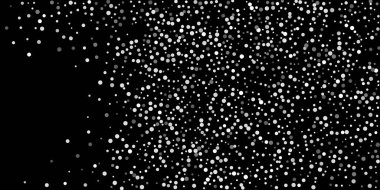 Siyah arka planda konfetilerin gümüş parlaklığı. Lüks arkaplan.