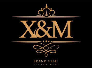 XM İlk logo, Amperand İlk logo altın kaplama ve klasik desenli.