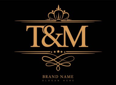 TM İlk logo, Amperand İlk logo altın kaplama ve klasik desenli.