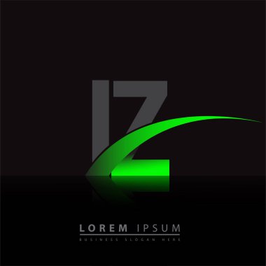 İlk harf IZ logotype şirket adı yeşil ve siyah swoosh tasarımı. iş ve şirket kimliği için vektör logosu.