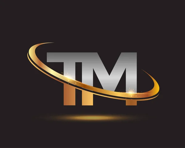 İlk harfi TM logotype şirketi. Renkli altın ve gümüş rengi desenli. Siyah arkaplanda izole.