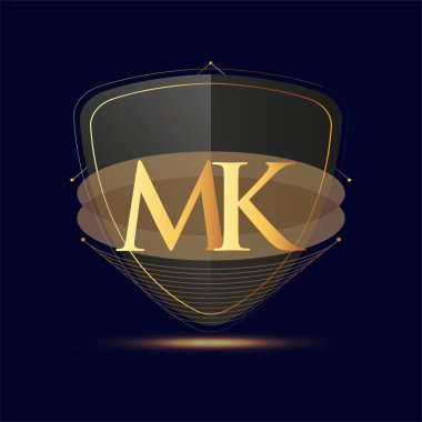 Kalkan simgesi olan ilk logo harfi MK koyu arkaplan üzerinde izole edilmiş altın renk, şirket kimliği için logotip tasarımı.