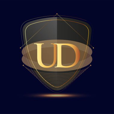 Kalkan simgesi olan ilk logo harfi UD koyu arkaplan üzerinde izole edilmiş altın rengi, şirket kimliği için logotip tasarımı.