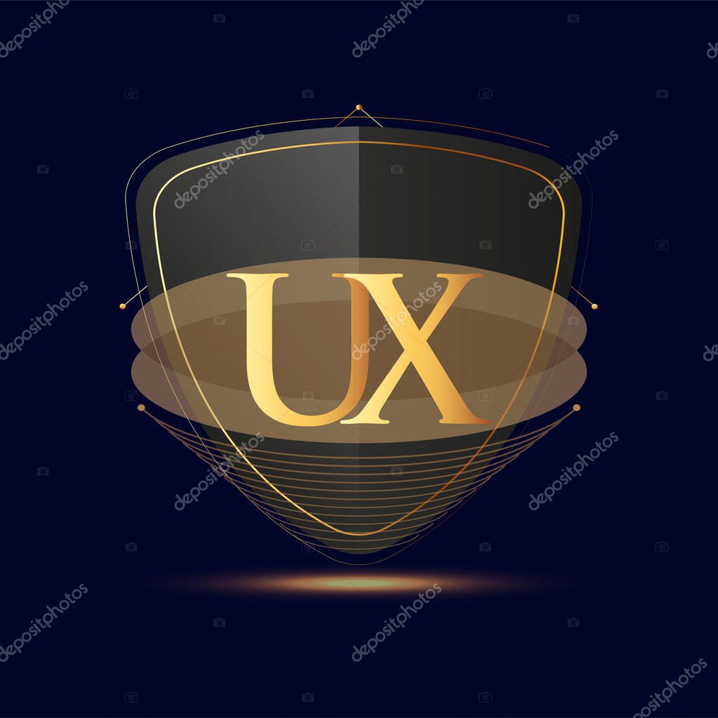 Initial logo letter UX with shield Icon golden color isolated on dark background, logotype design for company identity.