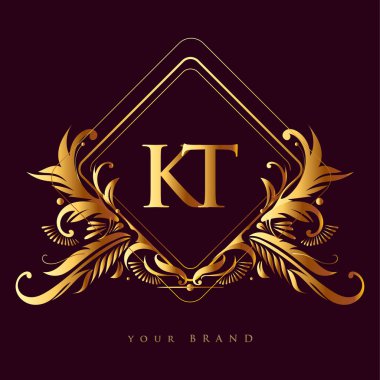 Süslü ve klasik desenli altın rengi olan ilk logo harfi KT, iş ve şirket kimliği için vektör logosu.