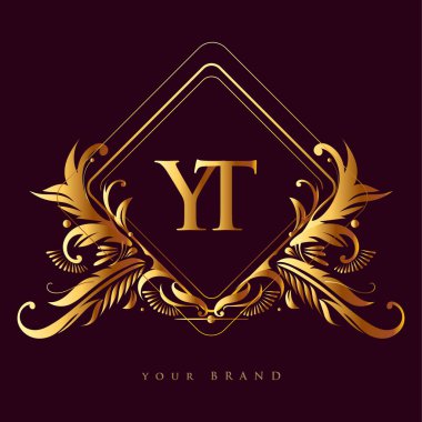 Süslü ve klasik desenli altın rengi olan ilk logo harfi YT, iş ve şirket kimliği için vektör logosu.