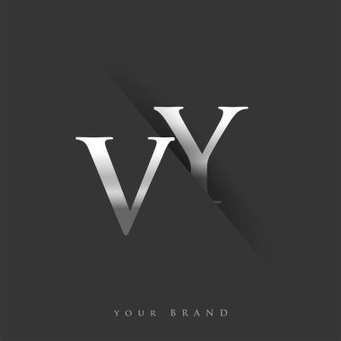 Şirketin adı için VY harfi, gümüş rengi ve siyah arka planda slash tasarımı. İş ve şirket kimliği için vektör logosu.