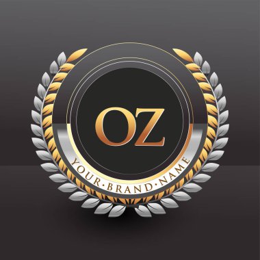 İIk logo harfi OZ altın ve gümüş renkli defne ve çelenk, şirket ve şirket kimliği için vektör logosu..