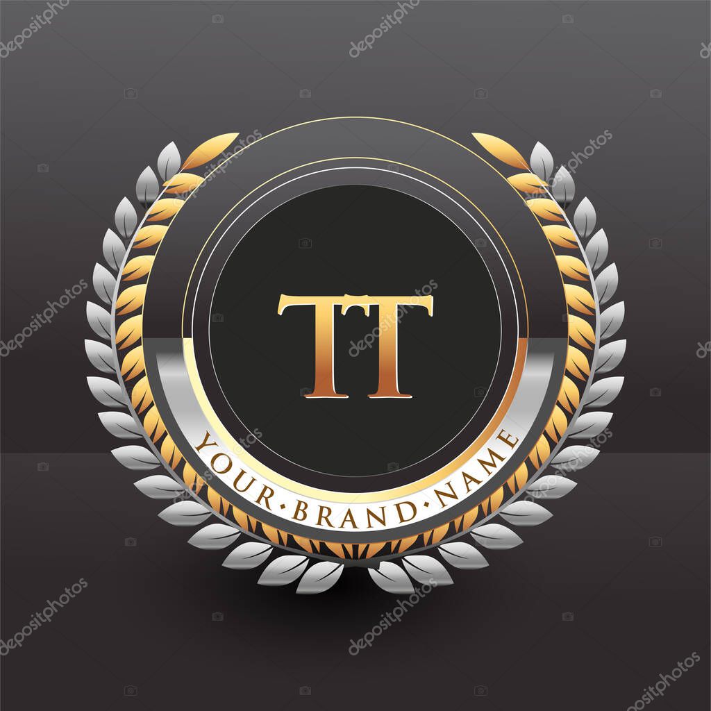 Initial logo letter TT with golden and silver color with laurel and wreath, vector logo for business and company identity.