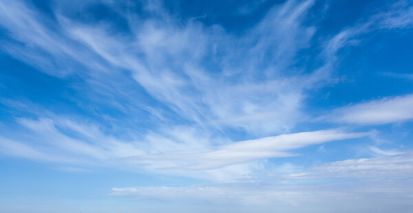 The background of blue sky with clouds
