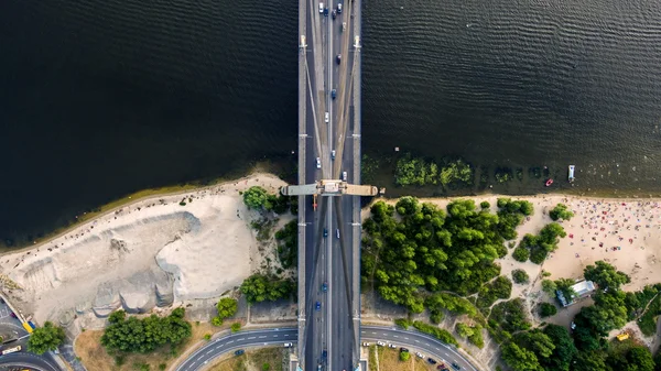 Aerial view of highway and Moscow bridge across the Dnieper. — Stock Photo, Image