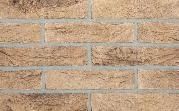Hintergrund aus der Textur eines schönen braunen Ziegels — Stockfoto