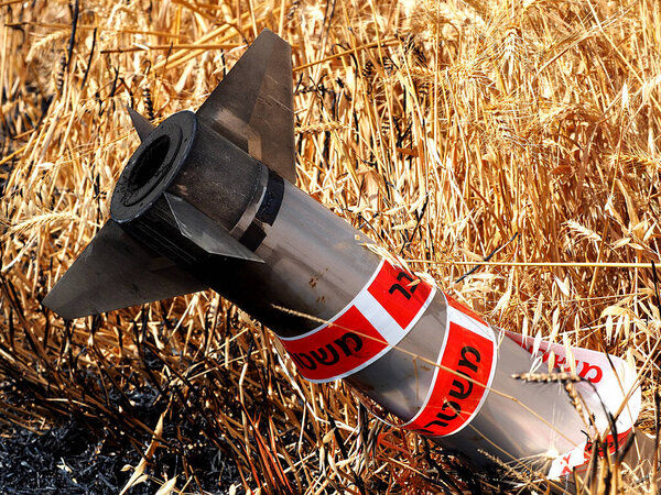 ISRAEL - MAY 17, 2021: a Hamas rocket fell in the grain fields of Israel near a peaceful settlement. 