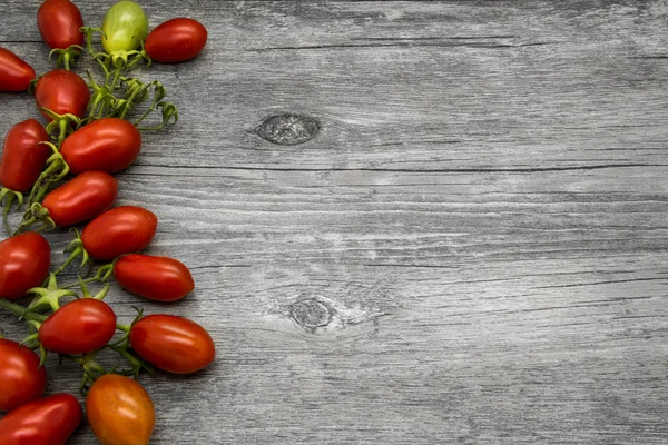 Tomates cereja Fotos De Bancos De Imagens Sem Royalties