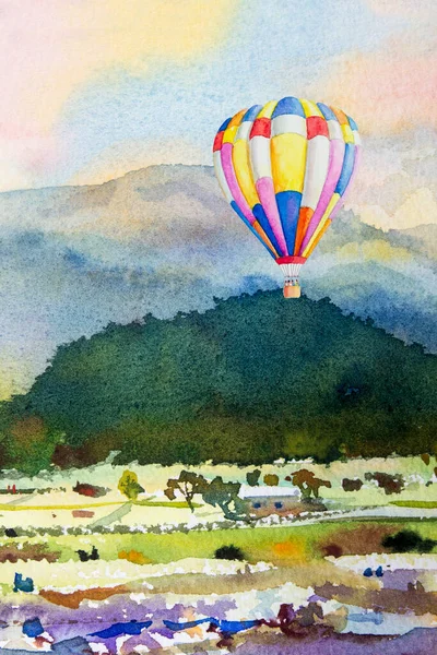 Watercolor landscape painting colorful of hot air balloon on mountain and cornfield emotion rural society, nature spring in sky background. Abstract paint illustration in Asia.