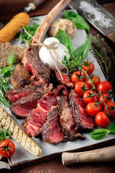 Tomahawk Grilled Steak Cut Pieces Vegetables Wooden Board Cooking Meat — Stock Photo, Image