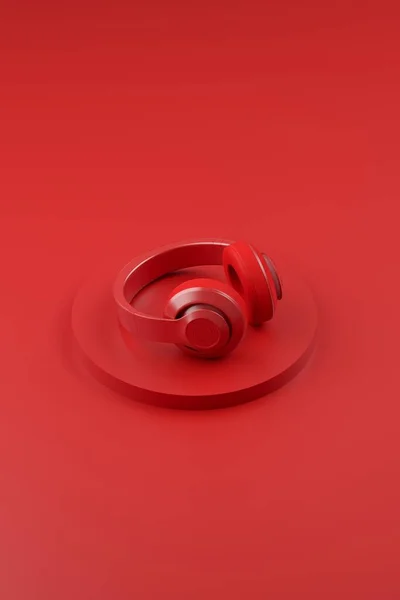 Imagem vertical de auscultadores brilhantes sobre um fundo vermelho. Design de fundo de áudio moderno monocromático. ilustração 3d Fotos De Bancos De Imagens